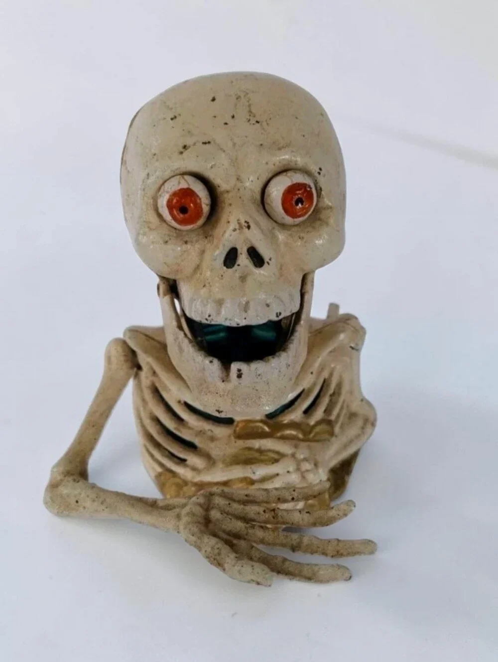 Vintage Toscano Cast Iron Mechanical Bugged-Out Hungry Skeleton Bank Money Box